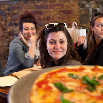 looking at a delicious new york pizza