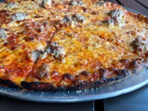 think crust sausage pizza