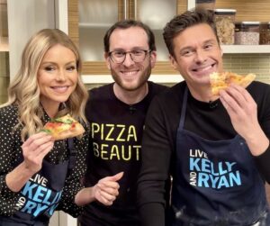 Kelly Ripa and Ryan Seacrest eating pizza with Scott Wiener