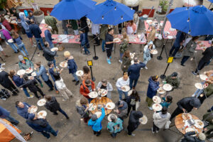 overhead shot of people at an outdoor pizza festival