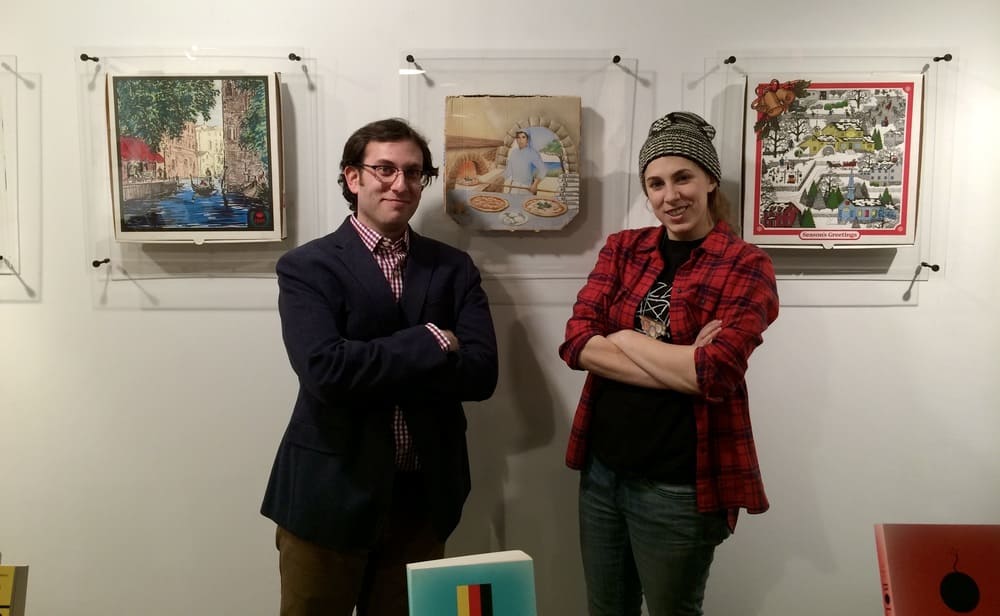 Scott Wiener and Steph Mantis at Melville House pizza box art display