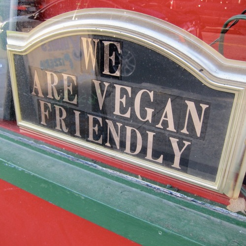 vegan friendly pizza sign