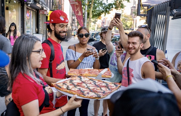 pizza tour outside serving pizza