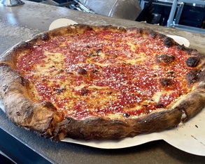 perfect pizza with sauce on top